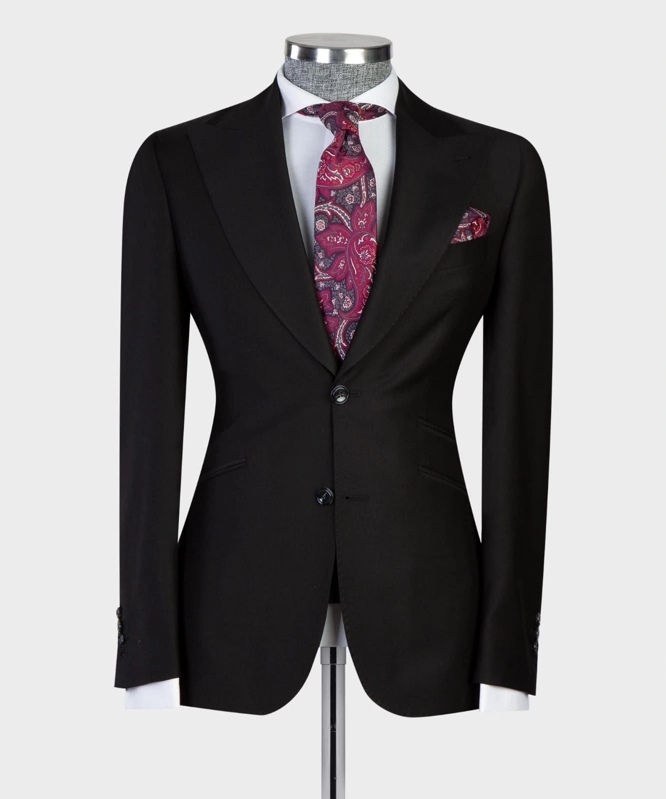Zwart Business Pak: Klassieke Elegantie in Drie Stukken voor de Stijlvolle Professional.